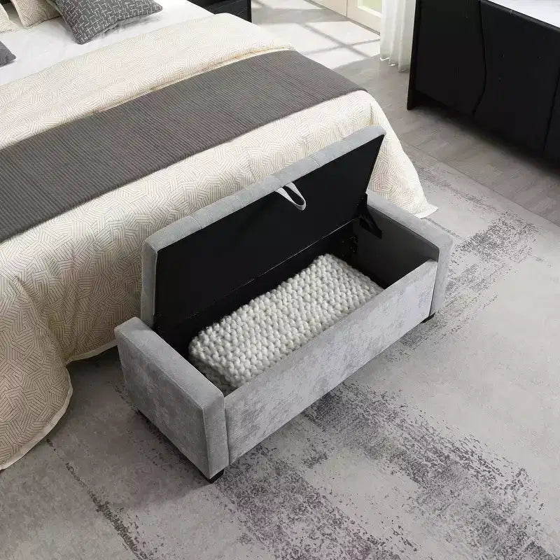 48 Pouf de rangement tapissé