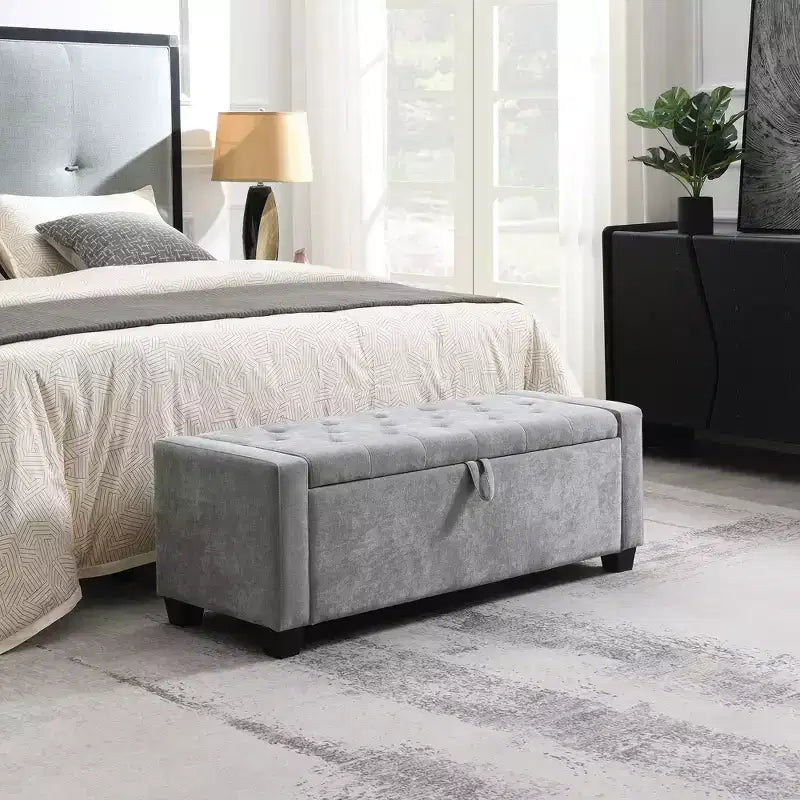 48 Pouf de rangement tapissé